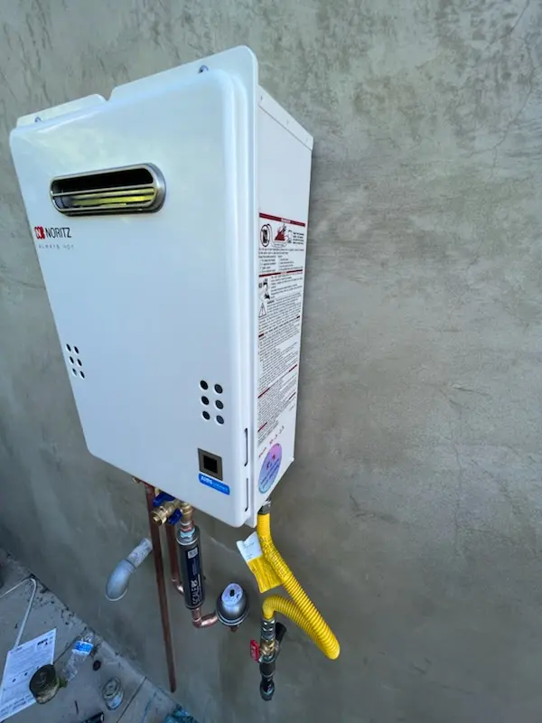 Tankless water heater installation for Stop 6 Sunrise homes